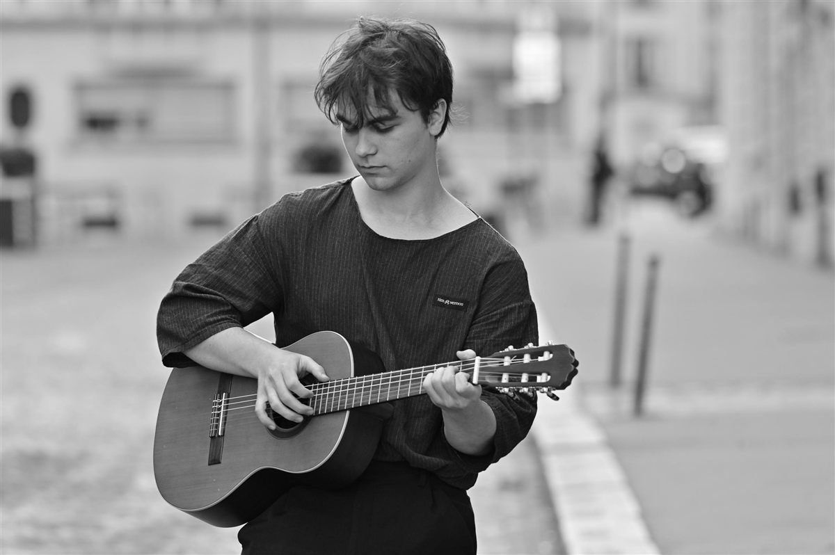Mark playing guitar